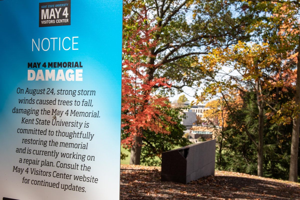 In the wake of a storm on August 24th, new signs commenting on the damage to the May 4 Memorial and the plans to repair it now accompany the memorial on Oct. 26, 2023.