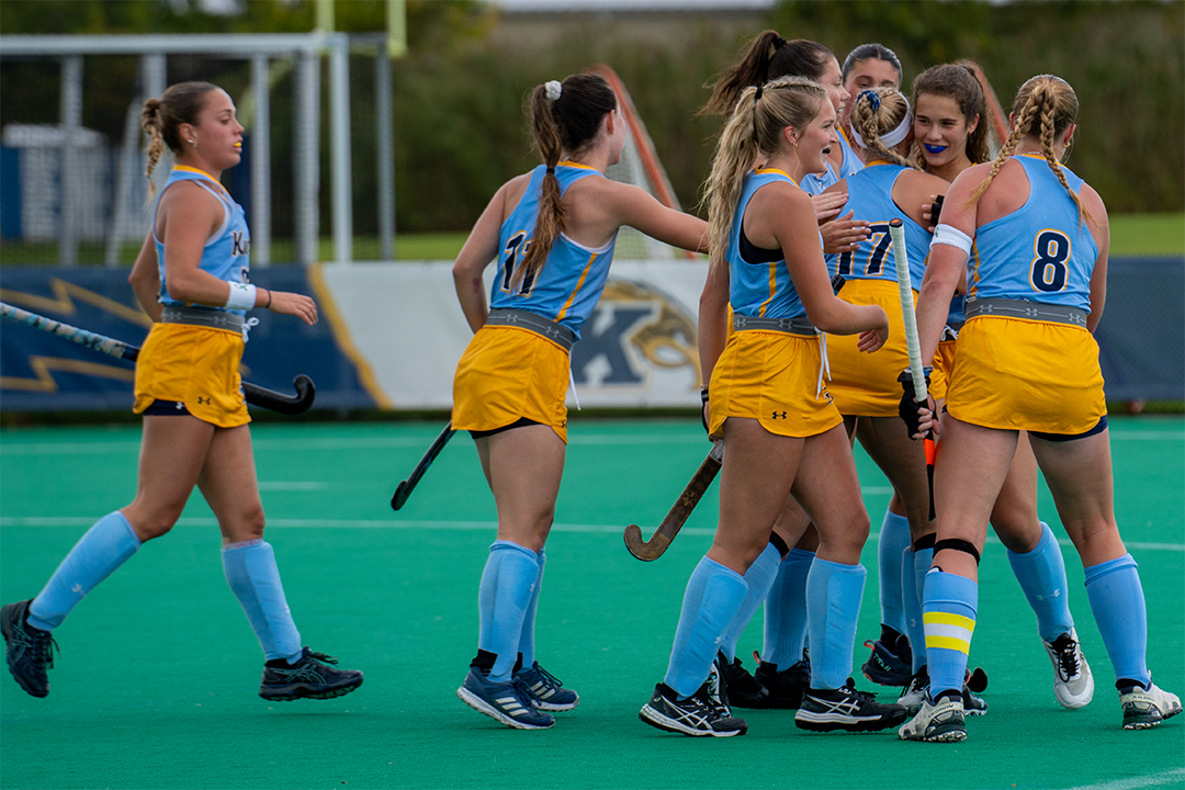 After a point by sophomore Patricia Strunk the Golden Flashes celebrate together. Oct. 15, 2023.