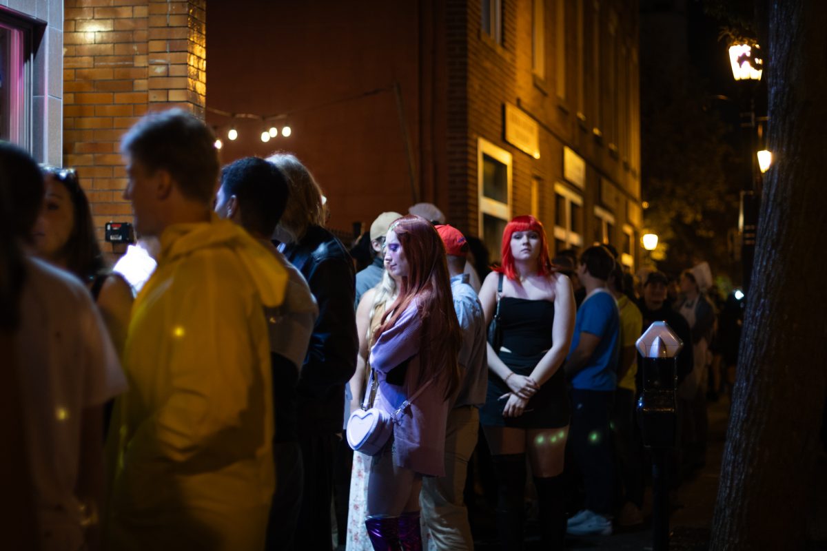 A long line of people wait to get into Water Street Tavern on Oct. 28, 2023.