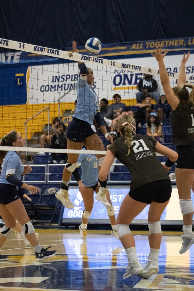 Golden Flash Burgundy Walters at the net in the volleyball game against Western Michigan on October 5, 2023.