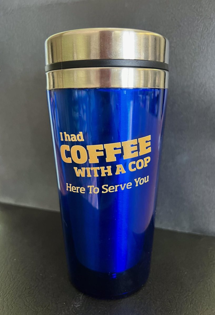 Coffee mugs given out to students at Wednesday's Coffee with a Cop event. 