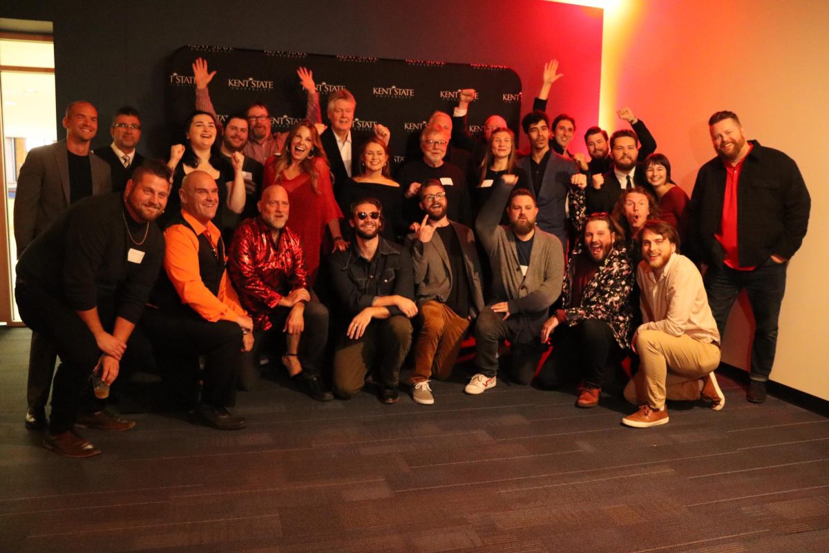 Cast and crew of the production pose during the "October Roses" at its premiere on Friday the 13th, October 2023.