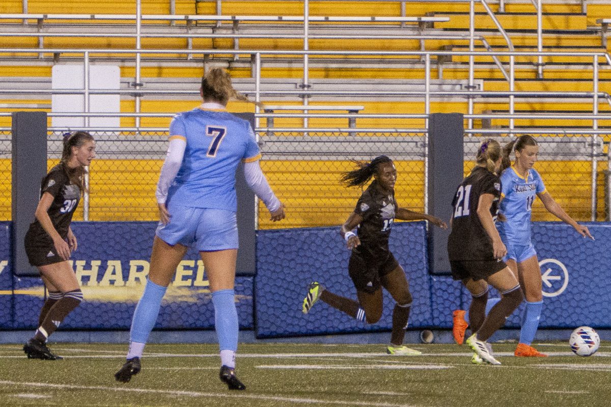 Midfielder Alisa Arthur (11) fights to keep it away from Western Michigan midfielder Heidi Thomasma (21) and defender Mira Pierre-Webster, with a waiting Siena Stambolich being defended by Olivia Bruinik on Oct. 19, 2023.