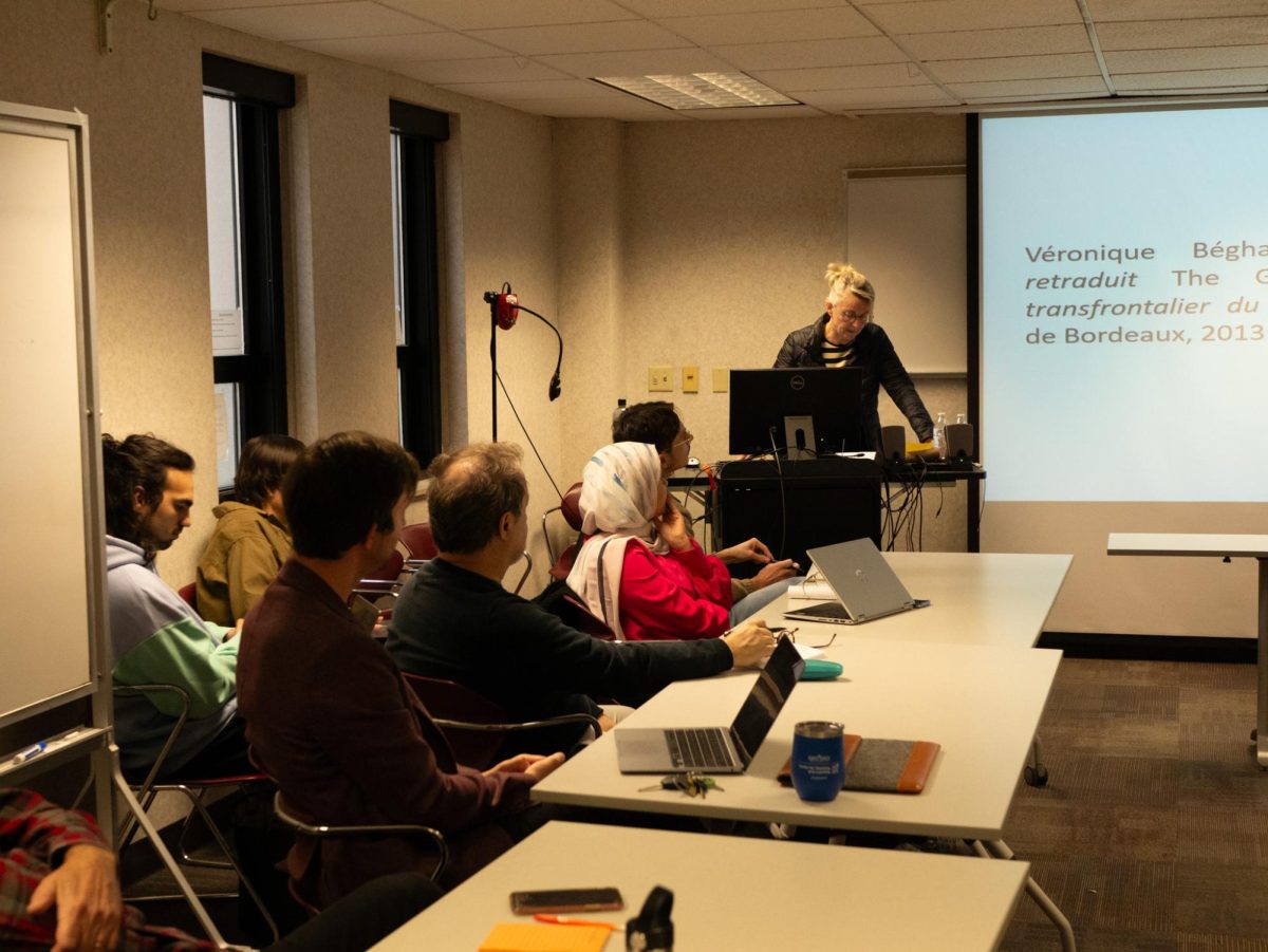 Véronique Béghain (center) presents about her work in French translation and other literary works in Satterfield Hall Oct. 20, 2023.