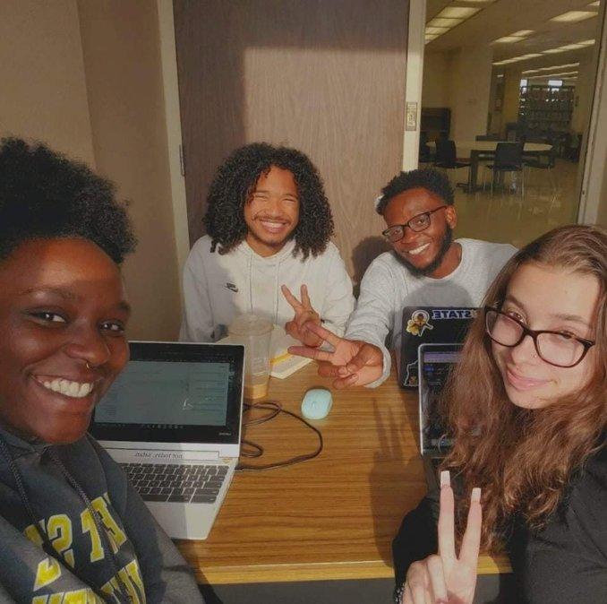 Senior psychology major Khayla Powell-Boyer (front left) studies with friends at the Kent State University library. 