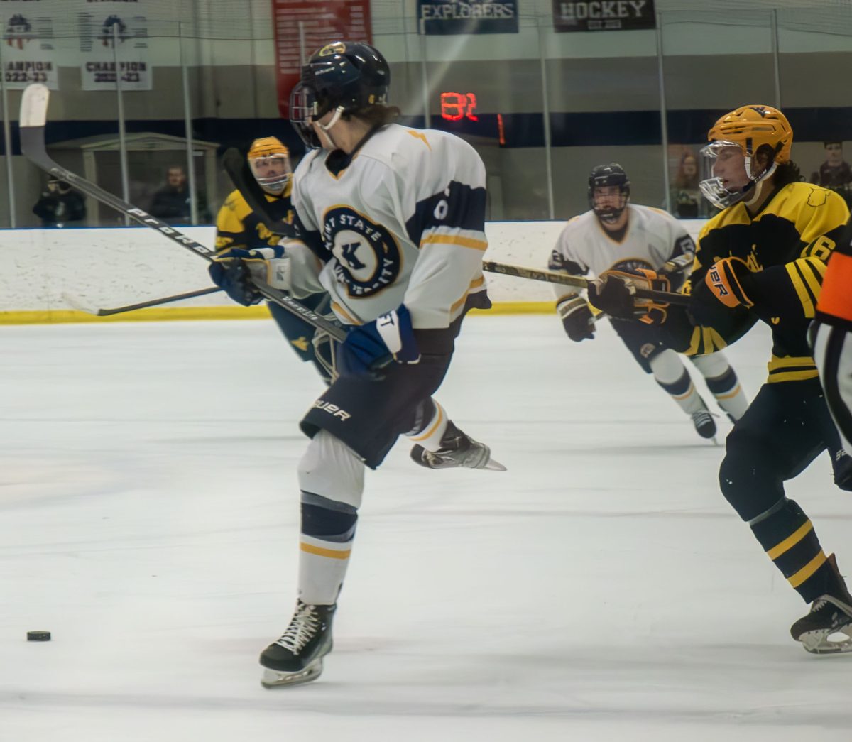 Kent State's Austin Weber dances around West Virginia's Marcus Barber to steal the puck during the Kent State Club Hockey Match on Nov. 10, 2023