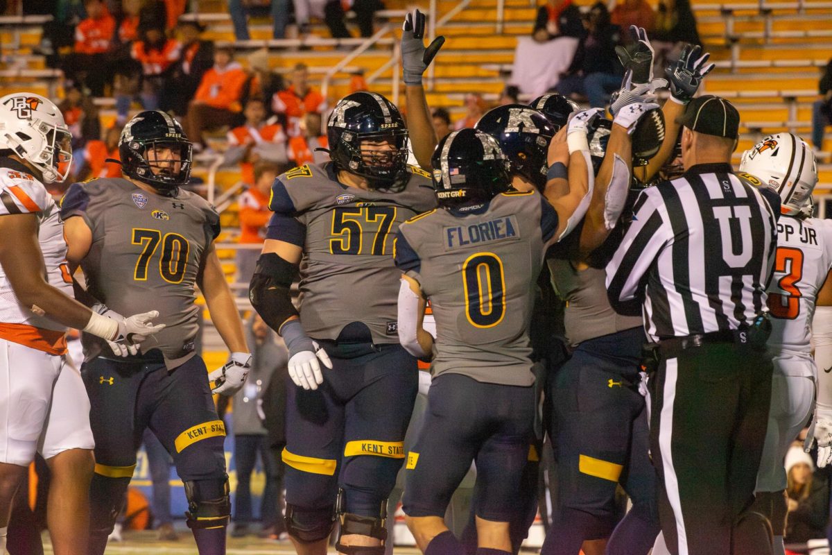 The Kent State football team celebrates a touchdown during the game against Bowling Green State Nov. 8, 2023.