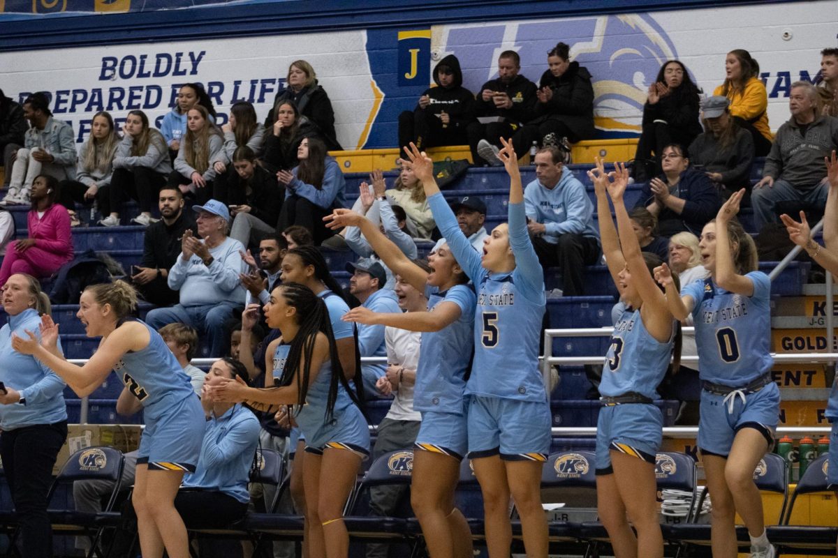 Kent State Golden Flashes cheer after a three-point shot in the game against Coppin State Eagles on Nov. 29, 2023.