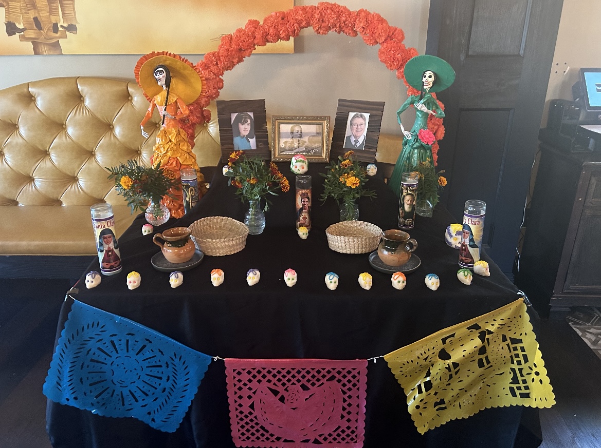 The Battleground's altar in the restaurant honors those who have passed on Día de los Muertos. 