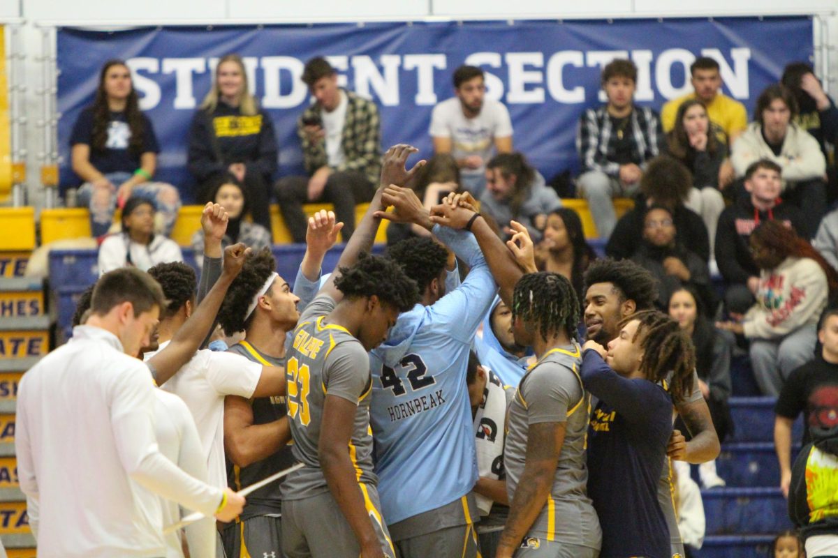 Team huddle before the men's basketball game on Nov. 30, 2023 kicked off. 