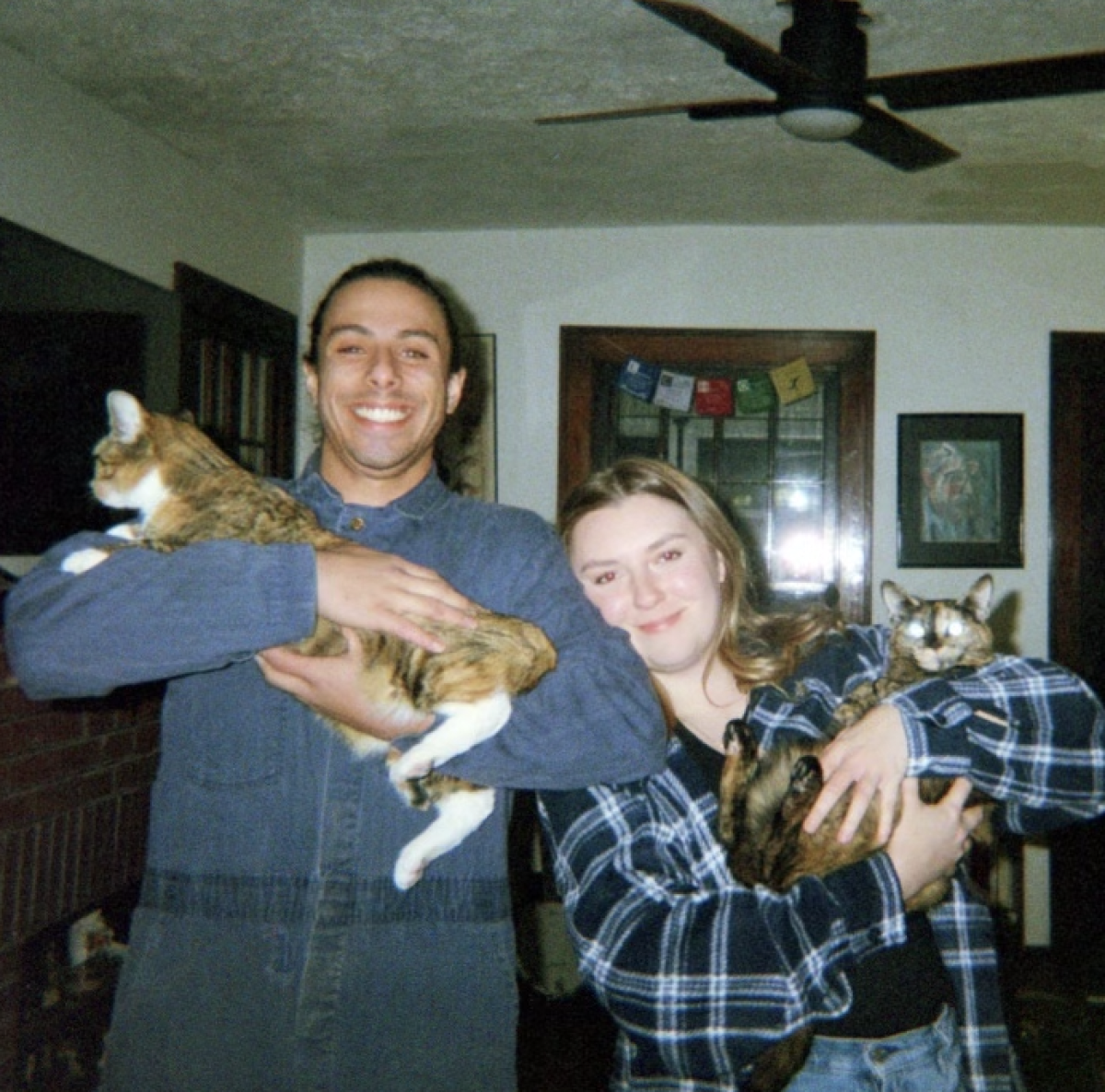 Krajnik with her partner, and two cats. Photo courtesy of Carlina Krajnik 