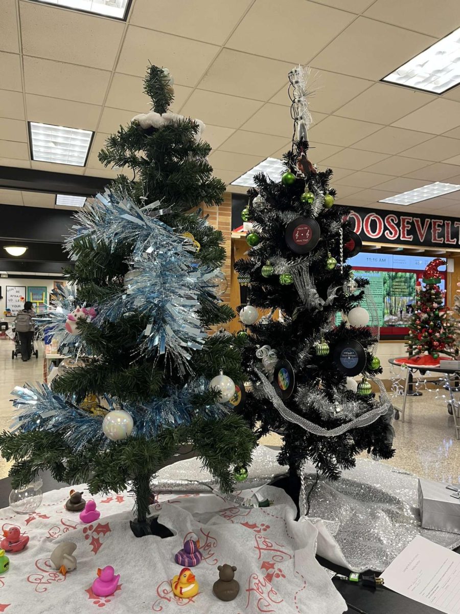 A few of the pre-decorated holiday trees displayed for the silent auction.