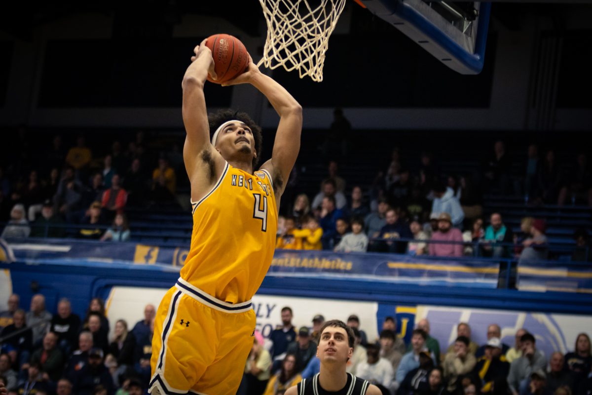 Grad student, Chris Payton Jr., goes in for the dunk in the game against Cleveland State on Dec. 9, 2023.