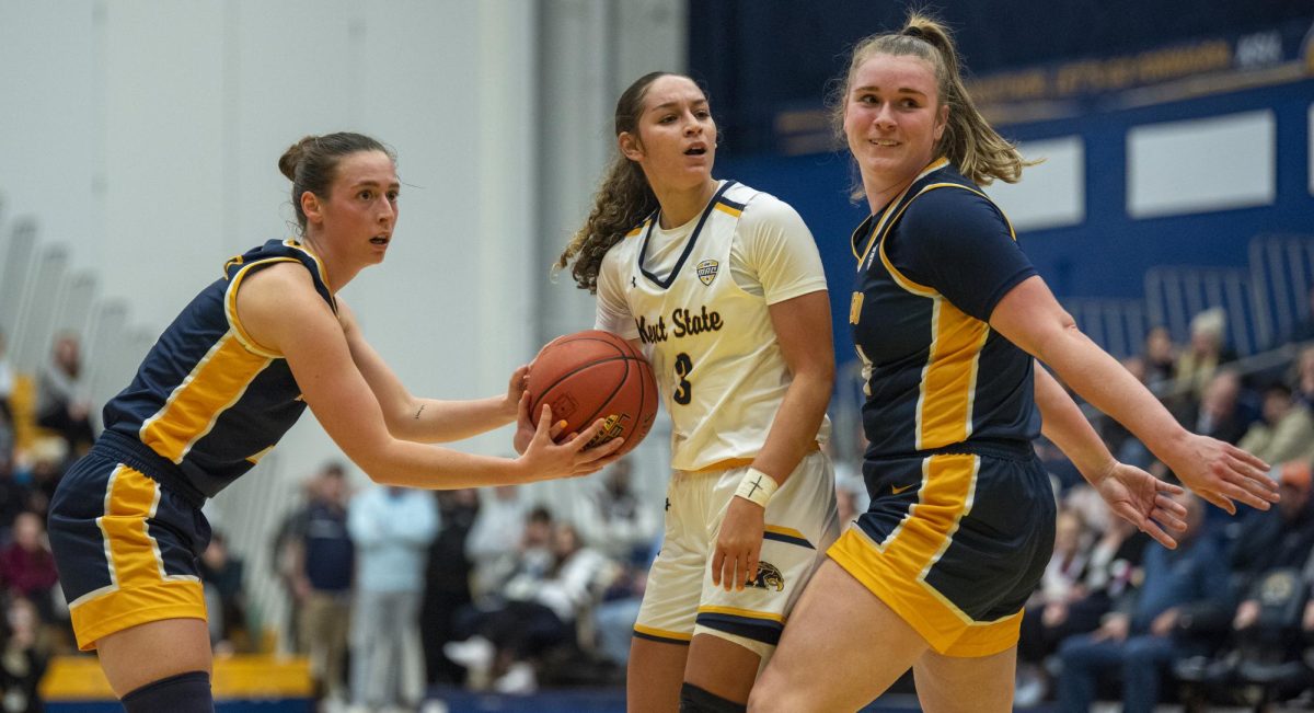 Toledo guard Sophia Wiard (left), Kent State sophomore guard Corynne Hauser and Toledo forward Jessica Cook react to the jump ball call during the Golden Flashes' 87-76 loss on Jan. 17, 2024.  