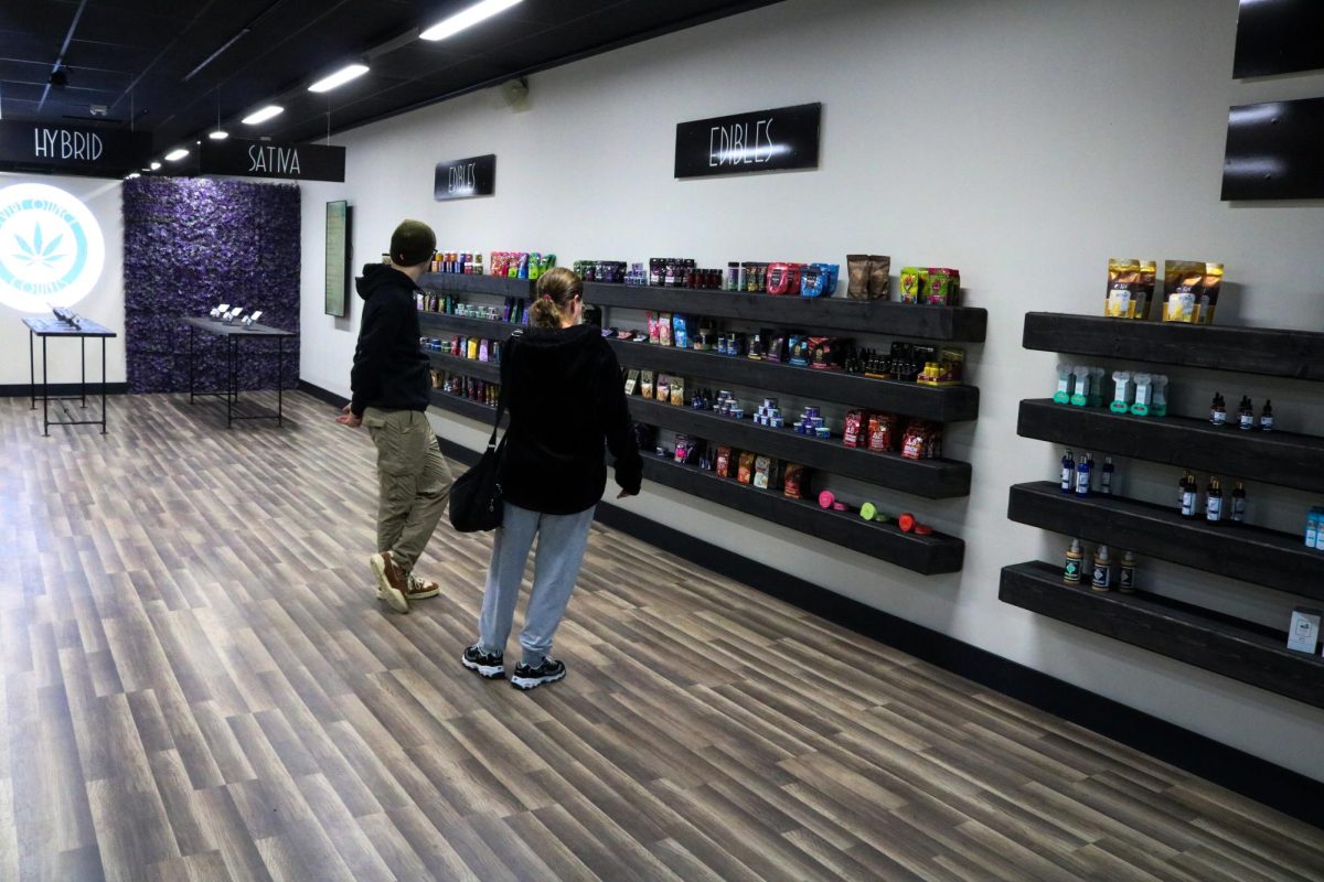 Customers shop for CBD products at Kent's new hemp shop on Jan. 27, 2024.