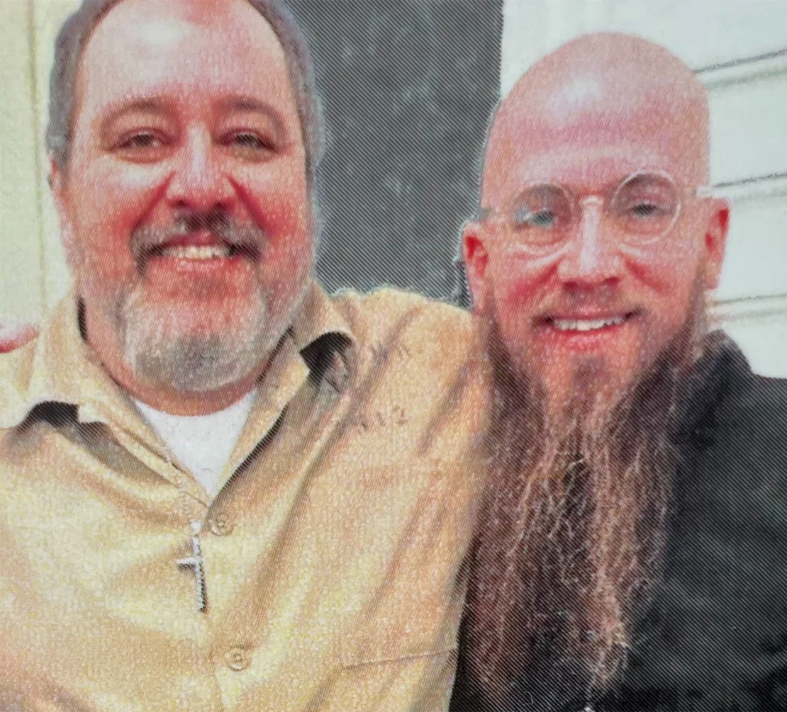 Kenneth Smith, left, embraces his spiritual advisor, the Rev. Jeff Hood.