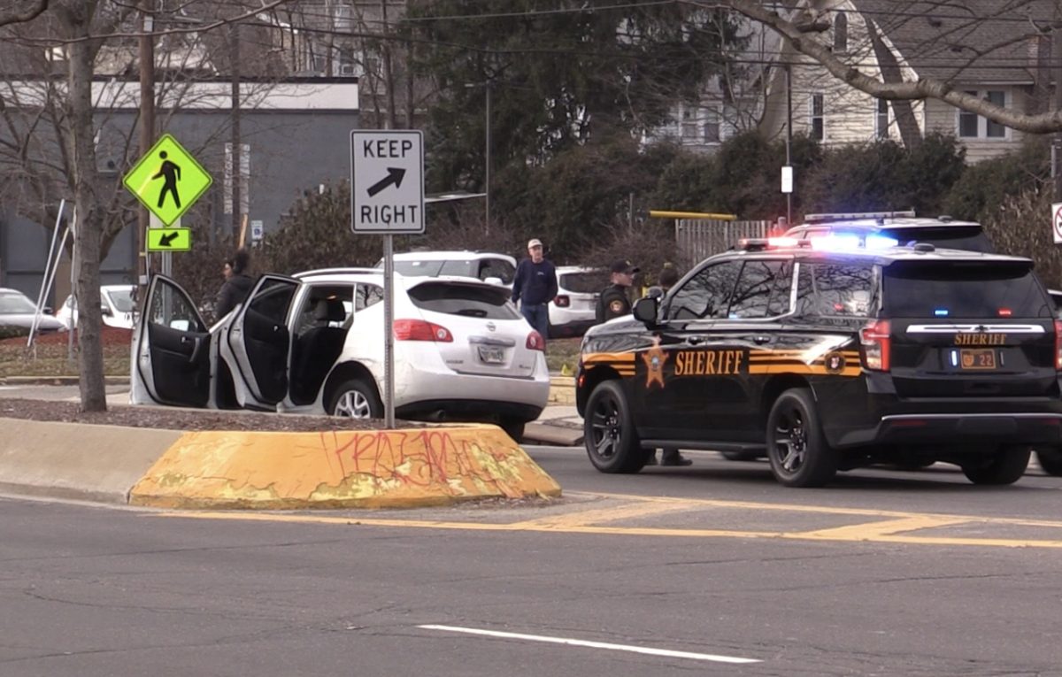 The Portage County Sheriff’s Office searches a stolen vehicle on East Main Street.  