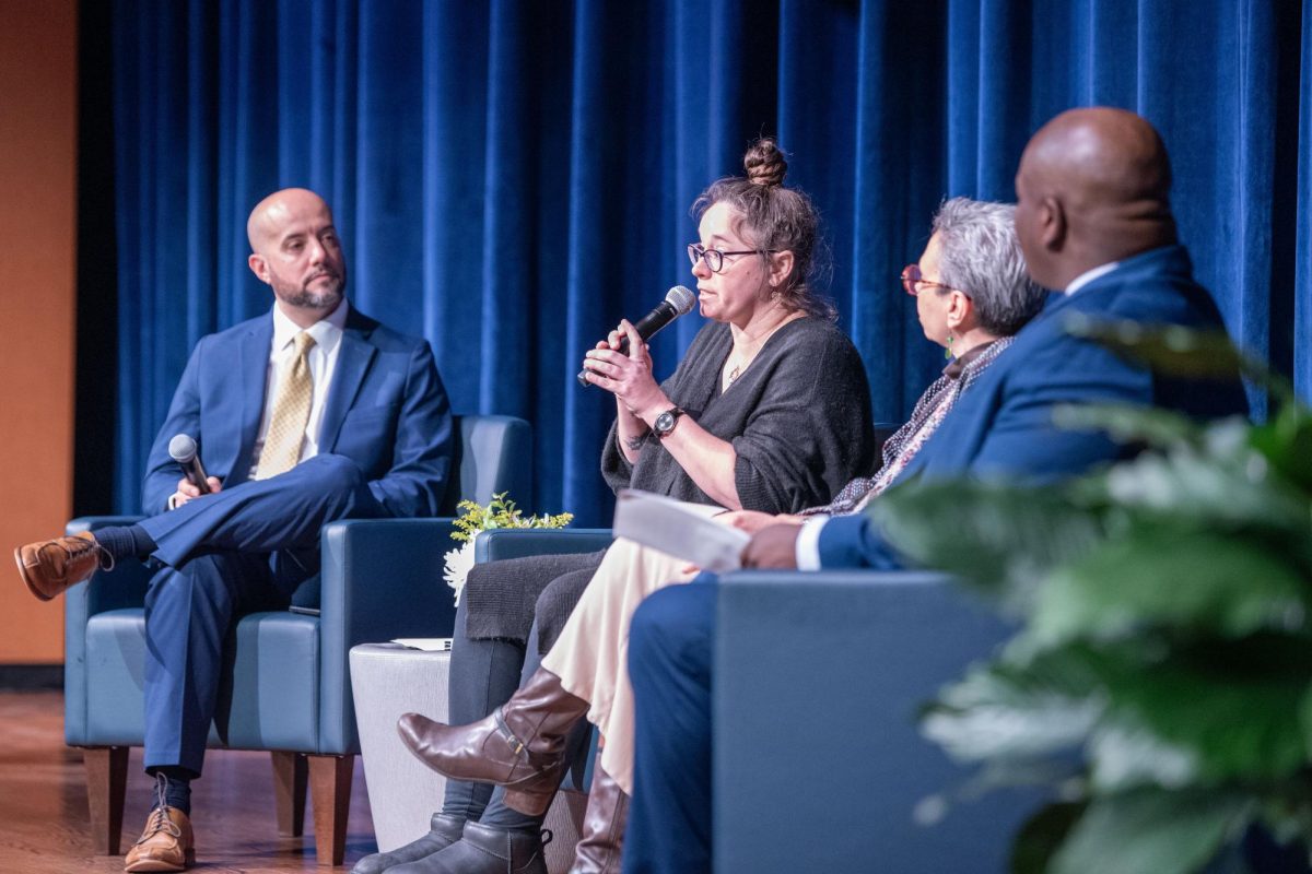 Jacquelyn Bleak (center left), Associate Lecturer in the School of Peace and Conflict Studies, answers one of Daniel Diaz Nilsson's (far left), Assistant Dean of Access and Engagement in the College of Education, Health and Human Services, during the "Dialogue and Difference: A New Understanding - MLK & Me: Living a Life of Love and Peace during Conflict" forum on Feb. 1, 2024.  Diaz Nilsson served as the moderator of the panel, with Bleak as a panelist.  