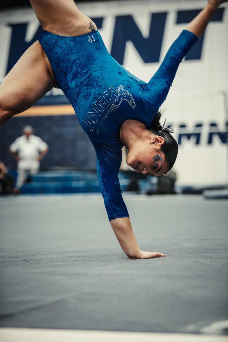  Junior Alyssa Guns during her floor performance Sunday afternoon.