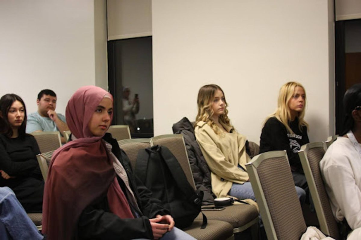 Kent State freshmen Doha Hussein, Lillian McCleery and Evie McCleery along with Kent State sophomore Lilah Keysor, attends the SJP's “Let’s talk about Gaza” event on Feb. 15, 2024.