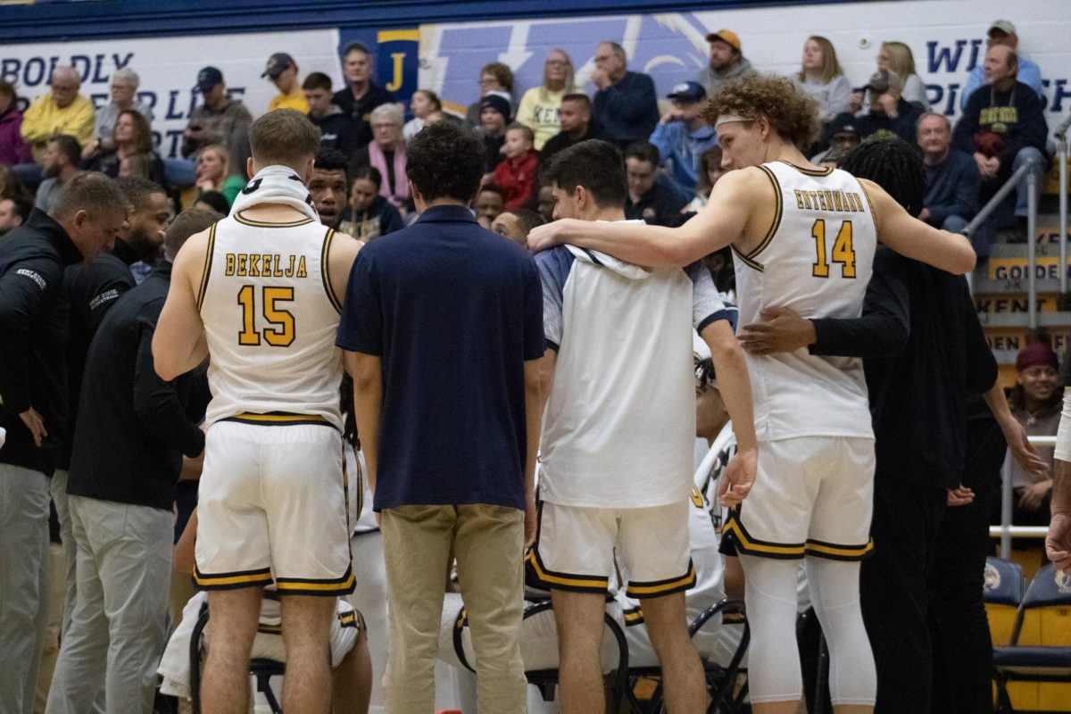 Kent State's men's basketball team huddles together during the 2nd half of the game against NIU on Feb. 17, 2024.