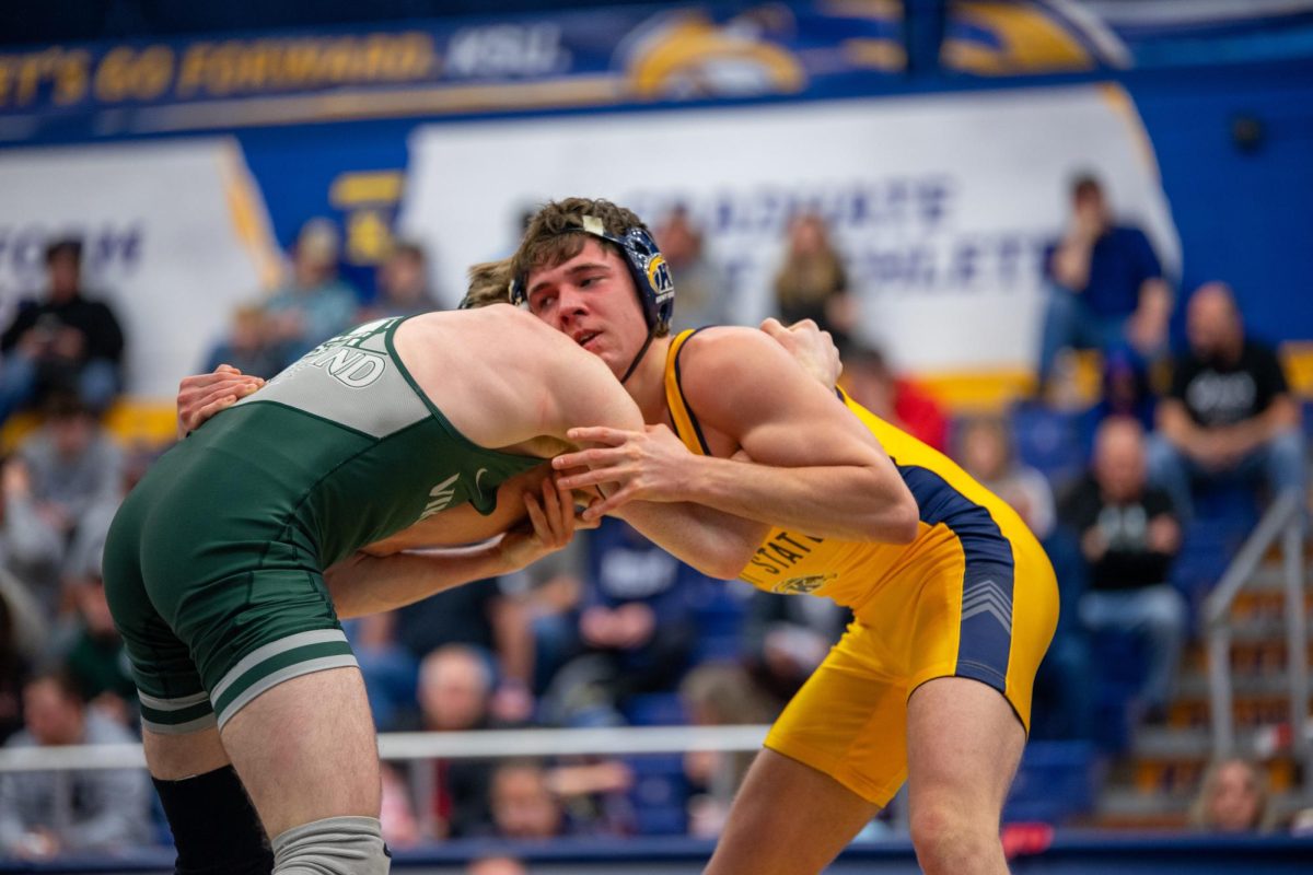 Kent sophomore Billy Meiszner faces off against Dylan Layton from Cleveland State during the wrestling meet on Feb. 22, 2024.