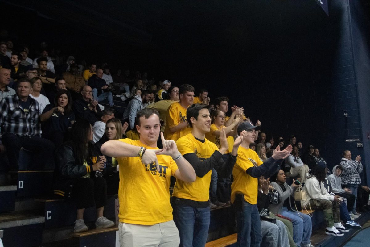 The Kent state student cheers after points are scored in the first half of the men's basketball game against Akron on February 23, 2024.