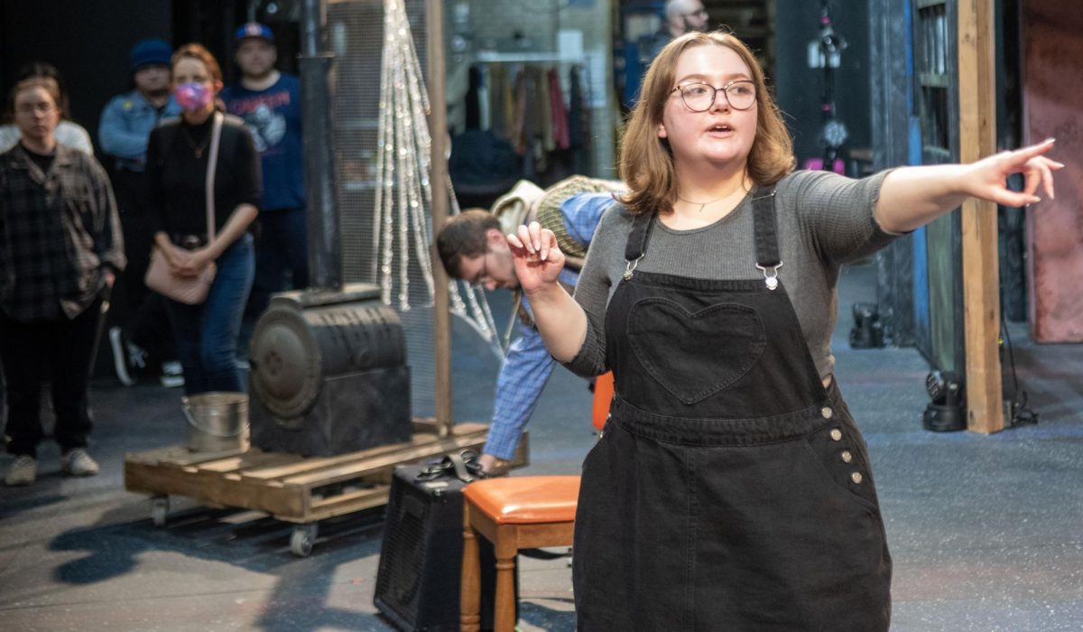 Production Stage Manager Lauren Downey informs the crew of the stage setup at the Orientation for Rent on Feb. 7, 2024.