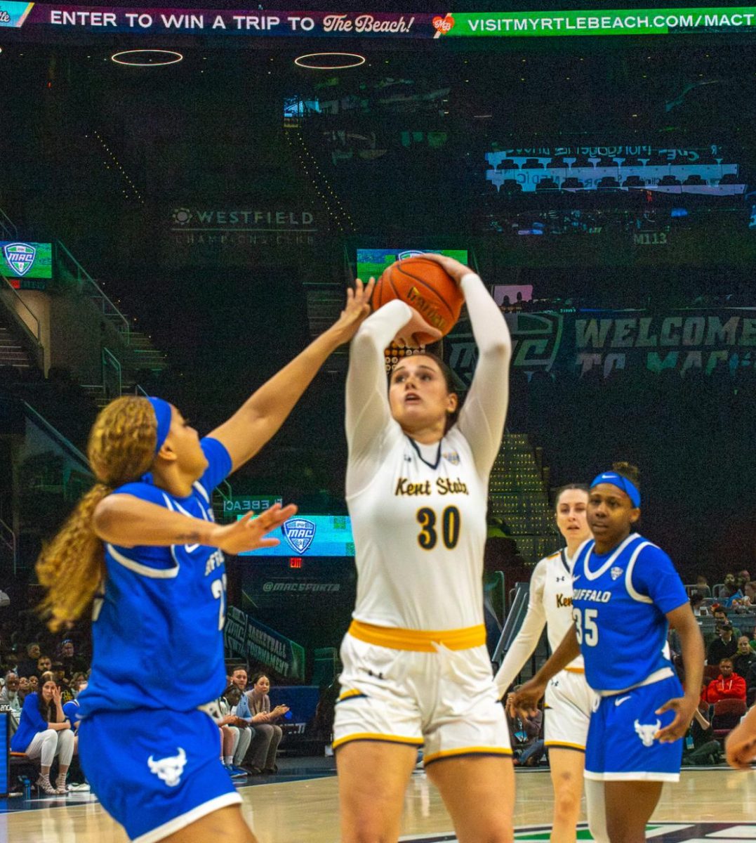 Kent State graduate student Mikala Morris gets ready to shoot a basket in the MAC Women's Basketball tournament championship game against Buffalo on Saturday, March 16, 2024. 