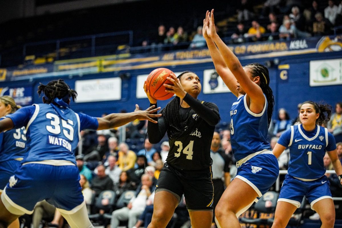 Freshman Janae Tyler fights through contact against Buffalo defender on March 2, 2024.