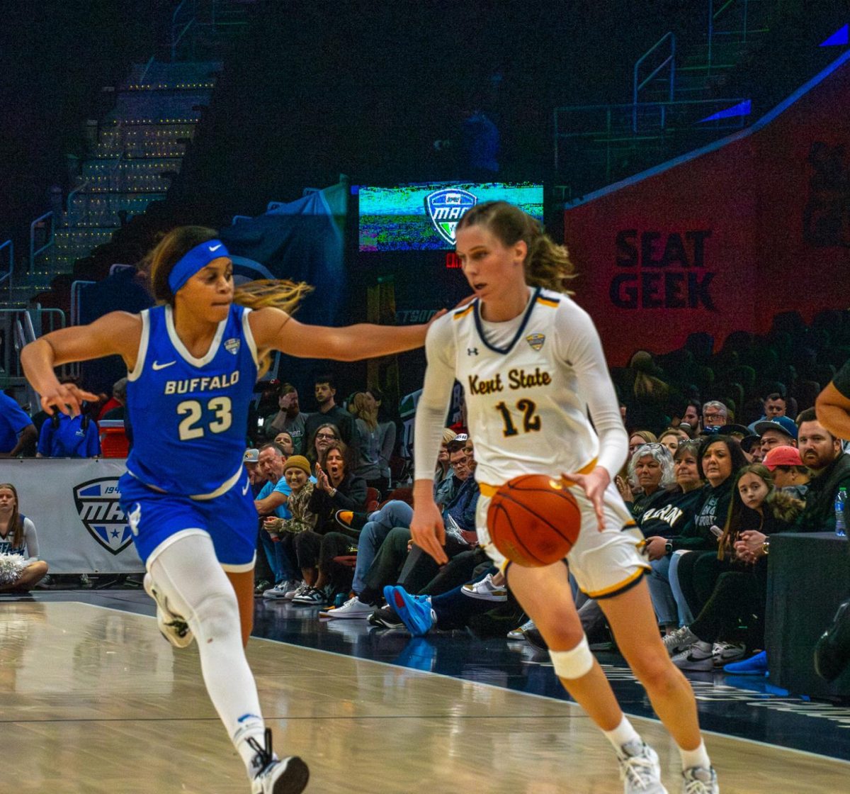 Kent State junior Jenna Batsch runs the ball down the court looking for a teammate to pass the ball to in the championship game against Buffalo at the MAC Women's Basketball tournament on Saturday, March 16, 2024. 