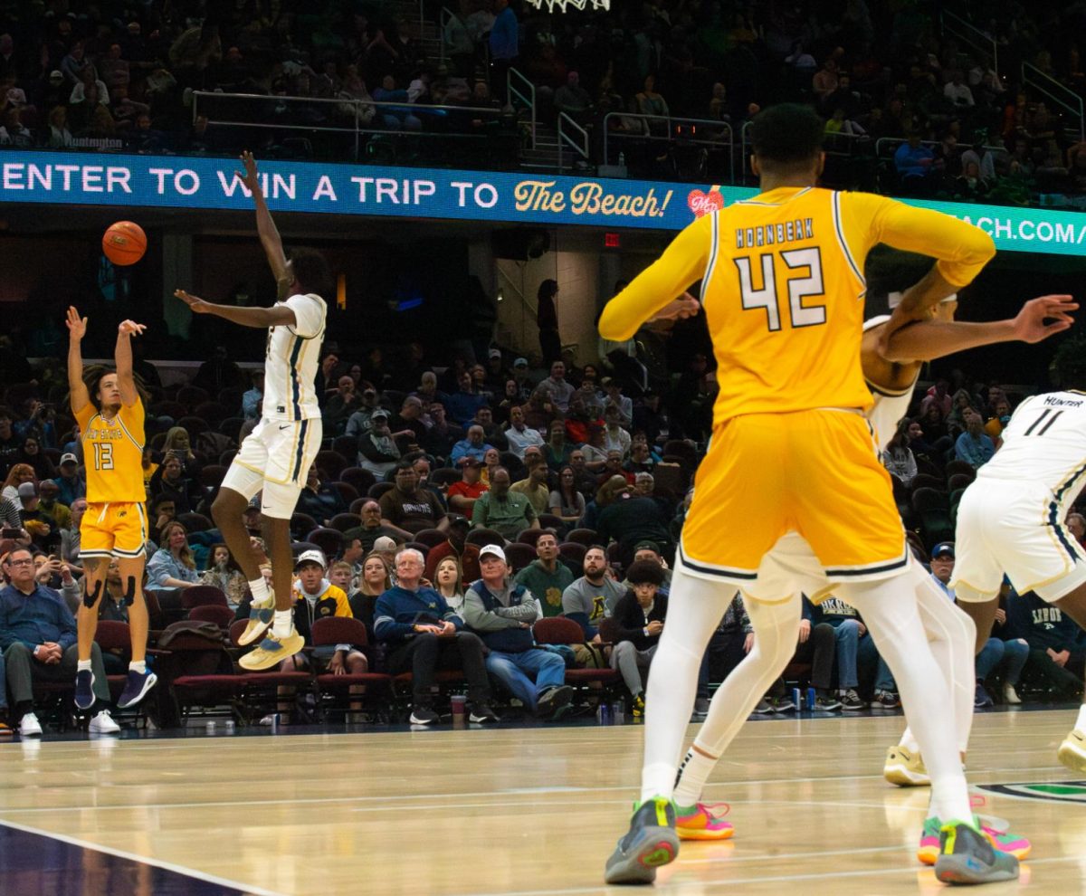 Kent State then-junior Jalen Sullinger shoots a three-pointer in the championship game against Akron at MAC Men's Basketball tournament on March 16, 2024. 