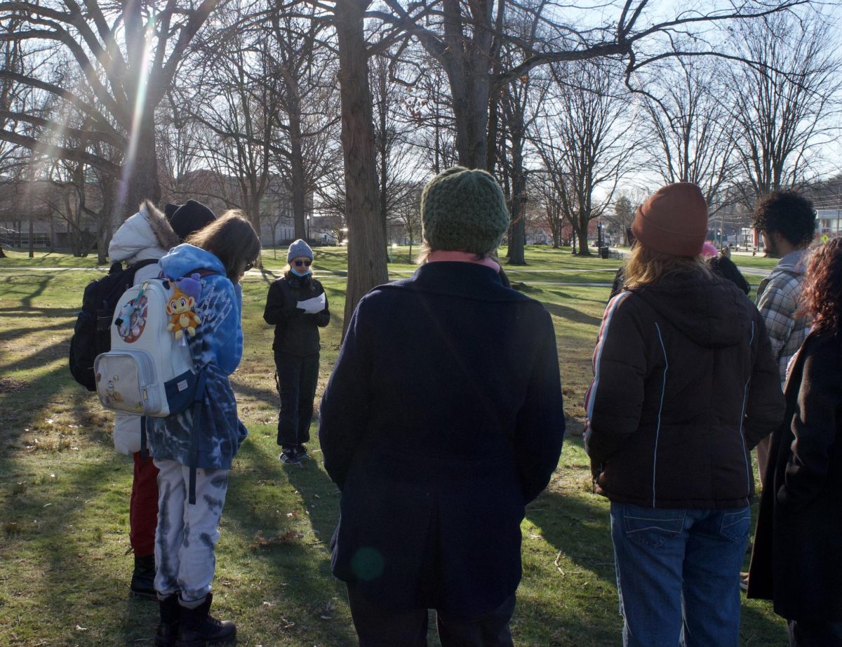 Kent student Harley Hill delivers a speech sharing their own experiences of transgender hate during the KSURGE Candlelight Vigil on March 21, 2024.