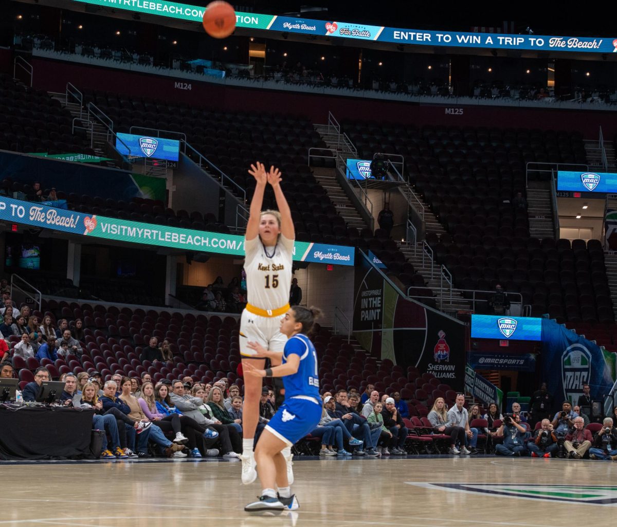 Bridget Dunn scoring against Buffalo at the Mac Women's Basketball tournament championship game on March 16, 2024.