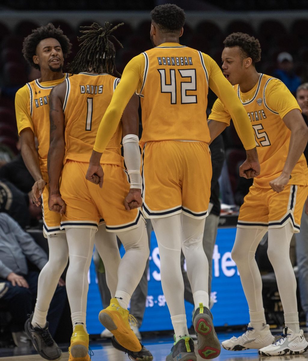 From left, redshirt sophomore guard Julius Rollins, redshirt junior forward VonCameron Davis, junior center Cli'Ron Hornbeak and freshman forward Donovan Hunter celebrate their lead going into a late game timeout on March 14, 2024.