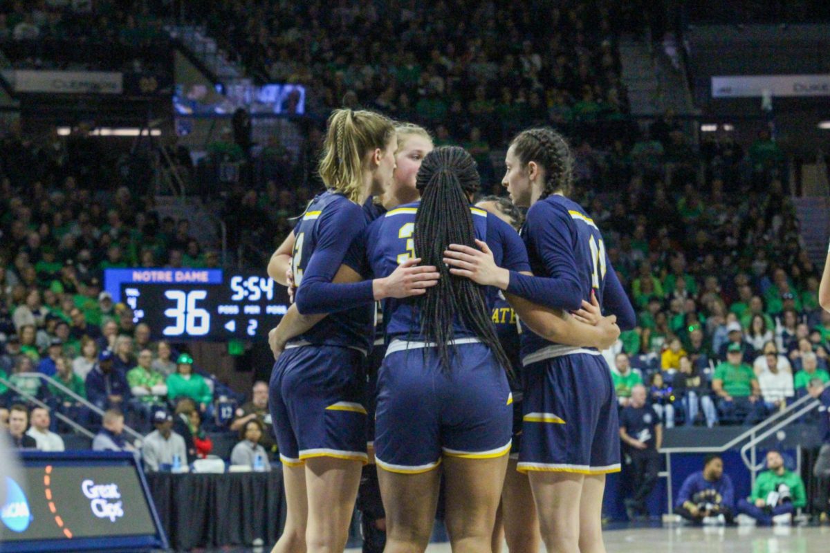 Kent State in a team huddle after a tough start to their game against the University of Notre Dame on March 23, 2024.