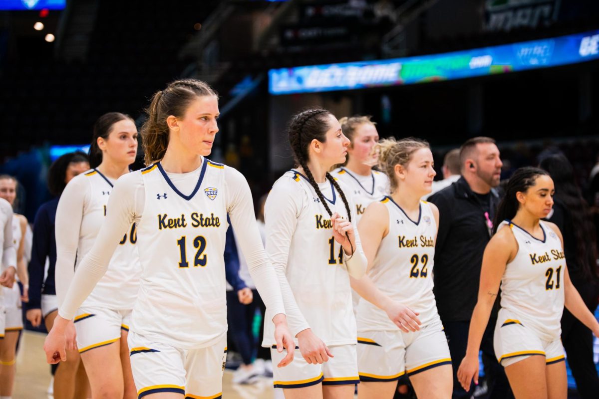 Kent State women's basketball team walks out of the court after winning against NIU in the first match of the Mid-American Conference Quarterfinal game March 13, 2024.