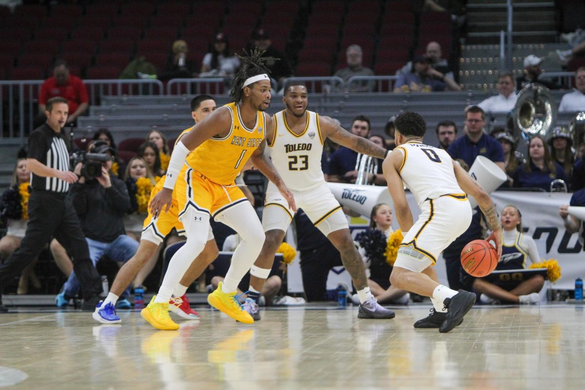 VonCameron Davis defends against the University of Toledo in their game on March 14th, 2024. 