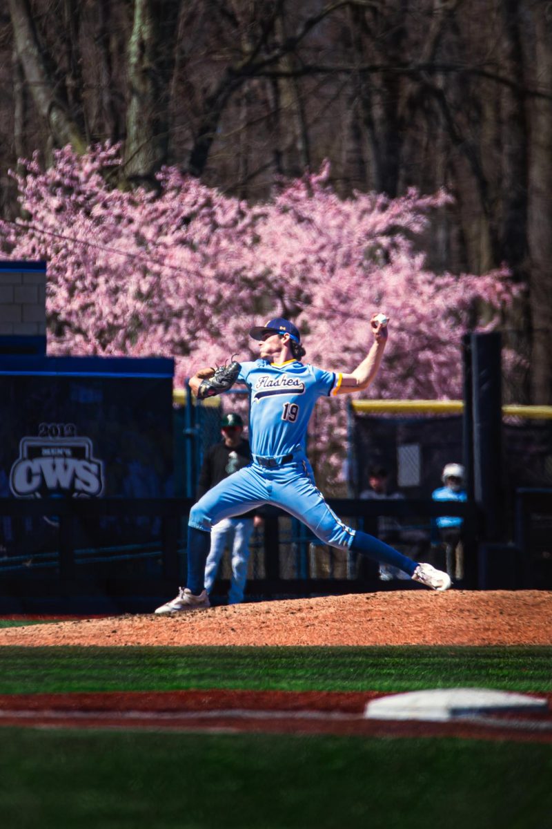 Junior Eric Chalus pitches a ball to the batter from East Michigan on April 7, 2024.