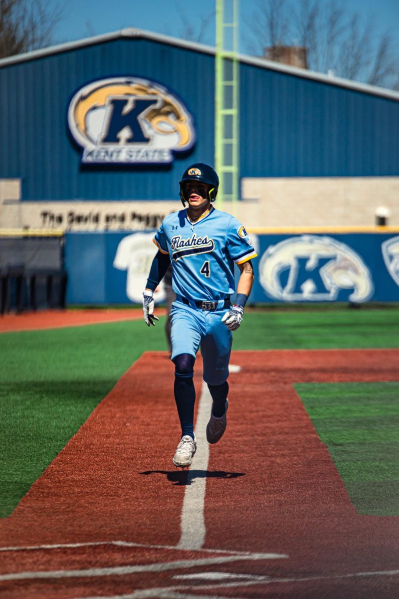 Junior Connor Ashby jogs to home plate on April 7, 2024.