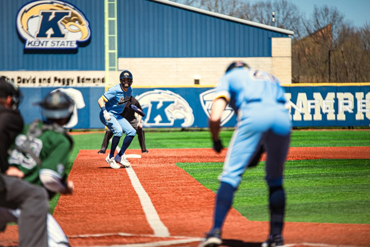 Redshirt Senior Josh Johnson prepares to run toward home as Junior Jake Casey steps up to bat on April 7, 2024.