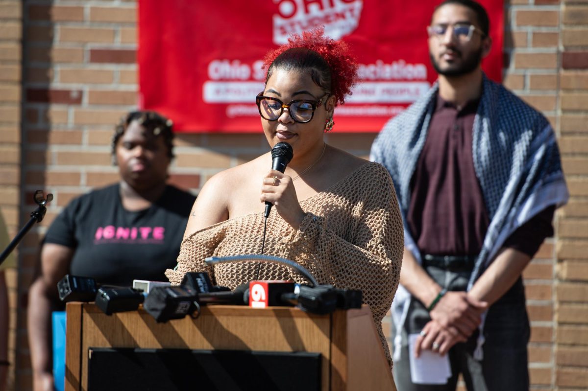 Junior A'Kyra Holley, co-director of Sister Circle, speaks during the press conference outside Oscar Ritchie Hall April 16, 2024.