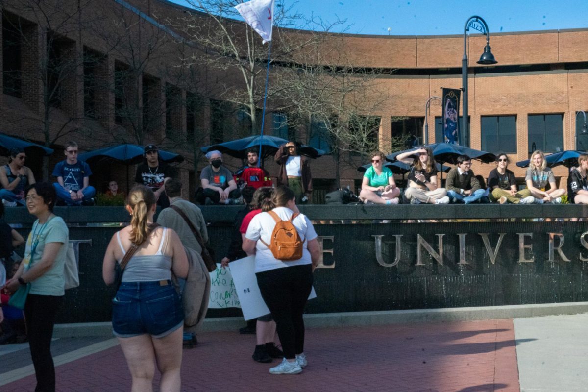 People start to gather on the K and around the fountain as the Kyle Rittenhouse protest picks up April 16, 2024. 