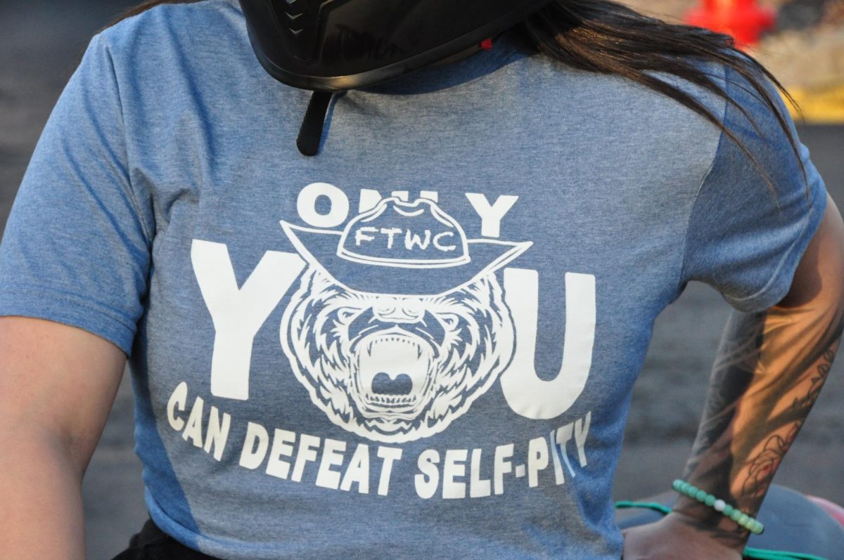 A model wears the "Only You" style t-shirt from the brand "For Those Who Can't."