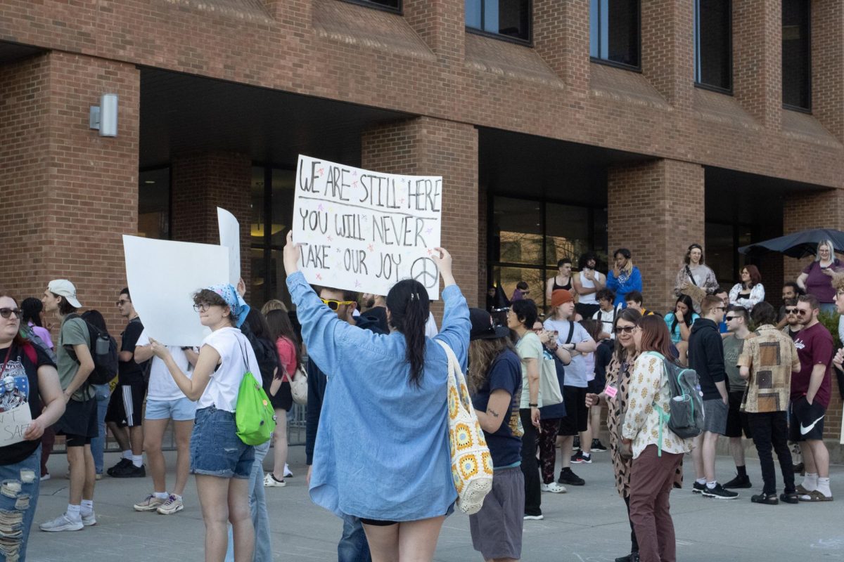 A crowd of stands up against Kyle Rittenhouse's presence on Kent State's campus on April 16, 2024. 