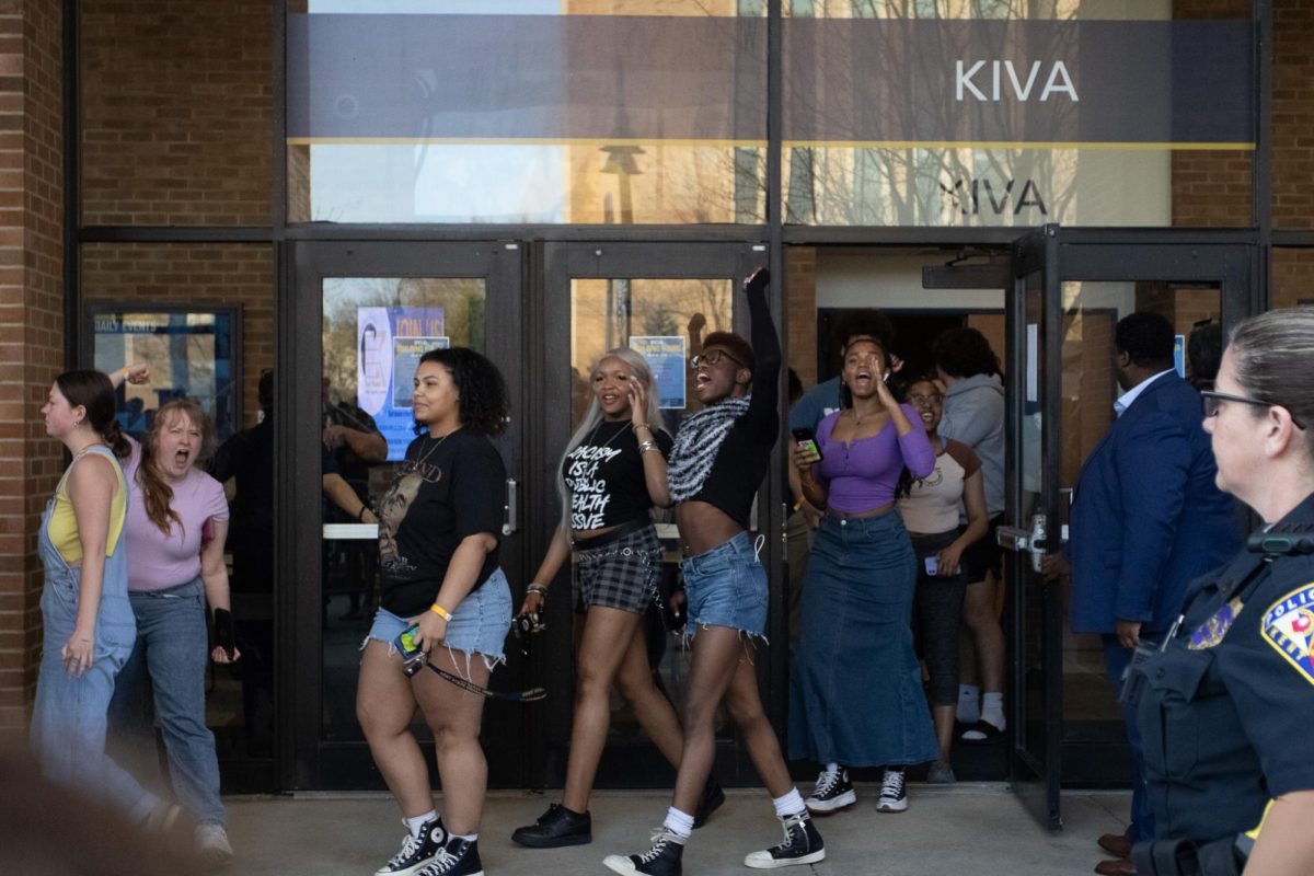 Attendees of "The Rittenhouse Recap" exit the KIVA while shouting "Black Lives Matter" toward the crowd of protestors April 16, 2024.