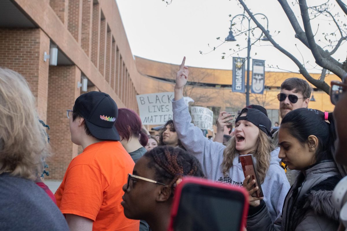 The crowd of protestors on April 16, 2024 shouts as the attendees of The Rittenhouse Recap exit the KIVA.