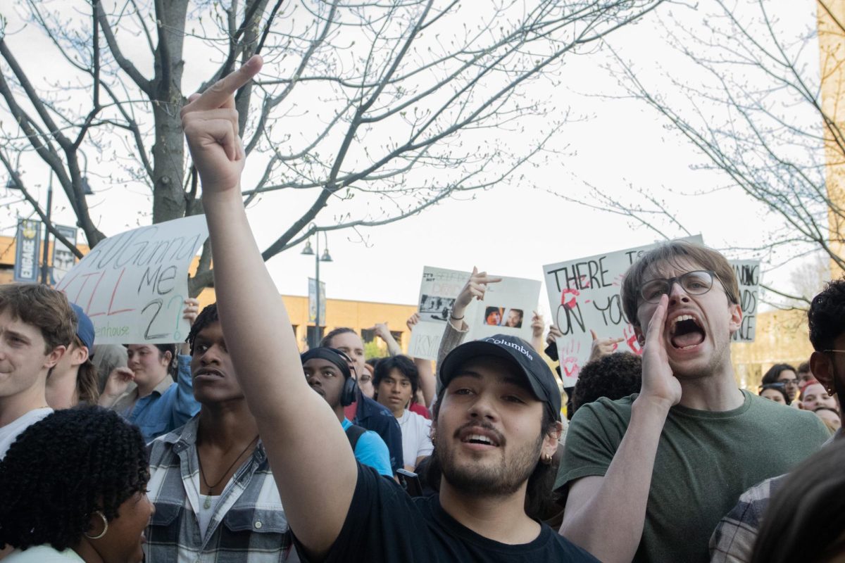 Kent State students crowded outside of the KIVA with signs to protest against "The Rittenhouse Recap" April 16, 2024.