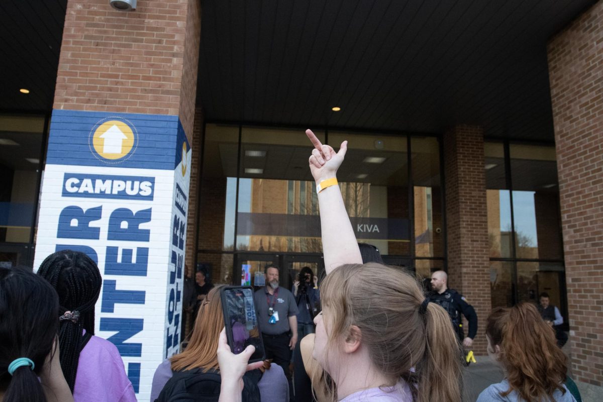 A protestor in the crowd outside of Kent State University's KIVA after The Rittenhouse Recap comes to a close.