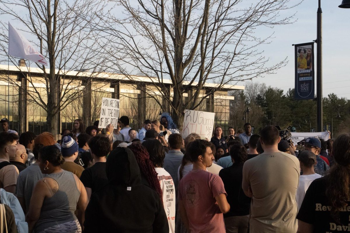 A crowd of protestors and attendees of The Rittenhouse Recap meet on April 16, 2024 shortly after the talk's end.